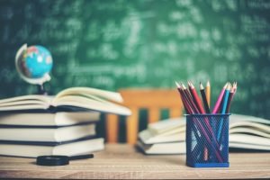 ¿QUÉ PUEDEN HACER LOS CENTROS ESCOLARES CON LOS DATOS PERSONALES DE LOS MENORES? book with green board background 300x200 - ¿QUÉ PUEDEN HACER LOS CENTROS ESCOLARES CON LOS DATOS PERSONALES DE LOS MENORES?