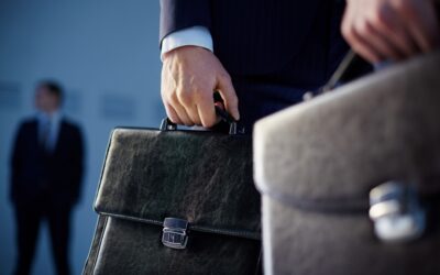 close up of workers with briefcases 400x250 - Blog