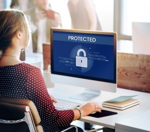 PREGUNTAS FRECUENTES: PROTECCIÓN DE DATOS Y CENTROS ESCOLARES woman working on computer network graphic overlay 300x264 - PREGUNTAS FRECUENTES: PROTECCIÓN DE DATOS Y CENTROS ESCOLARES